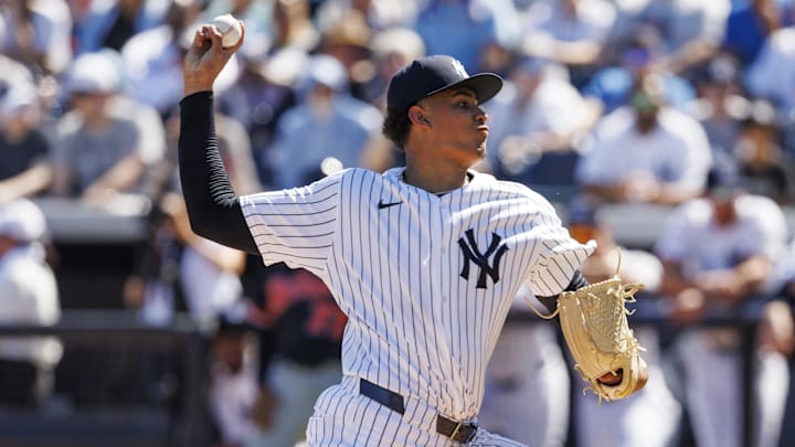 Feb 21, 2026; Tampa, Florida, USA; New York Yankees pitcher Carlos Lagrange (84) throws a pitch against the Detroit Tigers during the second inning in a Spring Training game at George M. Steinbrenner Field. Mandatory Credit: Morgan Tencza-Imagn Images