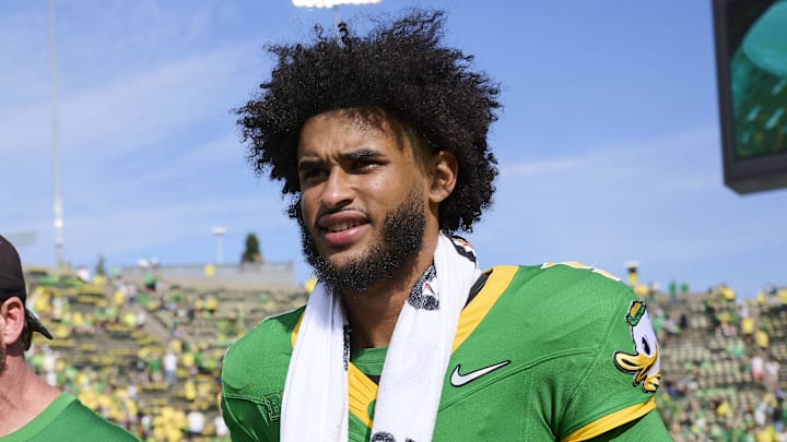 Aug 30, 2025; Eugene, Oregon, USA; Oregon Ducks quarterback Dante Moore (5) walks off the field after a game against the Montana State Bobcats at Autzen Stadium. Mandatory Credit: Troy Wayrynen-Imagn Images Aug 30, 2025; Eugene, Oregon, USA; Oregon Ducks quarterback Dante Moore (5) walks off the field after a game against the Montana State Bobcats at Autzen Stadium. Mandatory Credit: Troy Wayrynen-Imagn Images