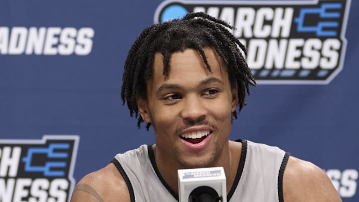 Arkansas Razorbacks guard D.J. Wagner (21) happily answers questions during a press conference before a practice session ahead of the first round of the men's 2026 NCAA Tournament at Moda Center. 