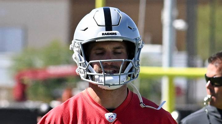 May 28, 2026; Henderson, NV, USA; Las Vegas Raiders quarterback Fernando Mendoza (15) and quarterback Kirk Cousins (8) warm up during organized team activities at Intermountain Health Performance Center. Mandatory Credit: Candice Ward-Imagn Images