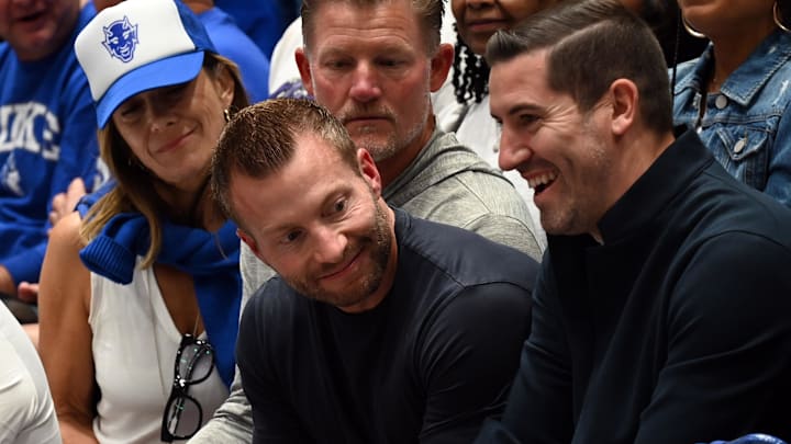 Mar 7, 2026; Durham, North Carolina, USA; Los Angeles Rams head coach Sean McVay (center) looks on from behind the Duke Blue Devils bench prior to a game against the North Carolina Tar Heels at Cameron Indoor Stadium. Mandatory Credit: Rob Kinnan-Imagn Images