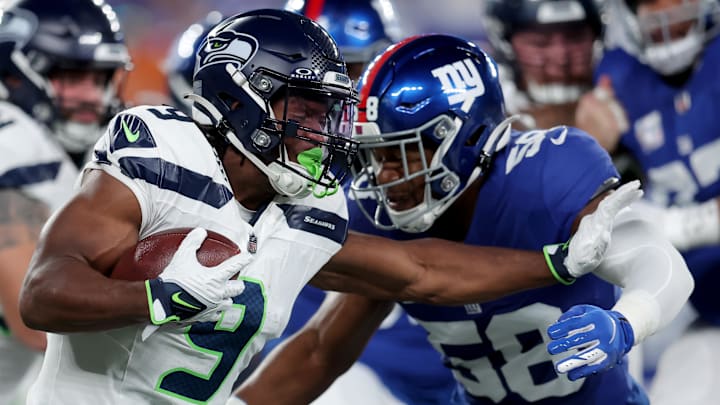 Oct 2, 2023; East Rutherford, New Jersey, USA; Seattle Seahawks running back Kenneth Walker III (9) is tackled by New York Giants linebacker Bobby Okereke (58) during the first quarter at MetLife Stadium. Oct 2, 2023; East Rutherford, New Jersey, USA; Seattle Seahawks running back Kenneth Walker III (9) is tackled by New York Giants linebacker Bobby Okereke (58) during the first quarter at MetLife Stadium.