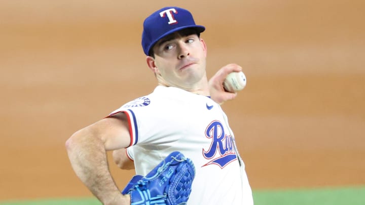 Sep 18, 2024; Arlington, Texas, USA;  Texas Rangers starting pitcher Cody Bradford (61) throws during the first inning against the Toronto Blue Jays at Globe Life Field.