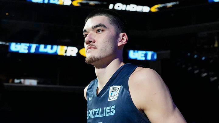 Grizzlies' Zach Edey (14) runs on the court as he is introduced during open practice at FedExForum in Memphis, Tenn., on Sunday, October 6, 2024. Edey scored 10 points and collected five rebounds against the Charlotte Hornets.