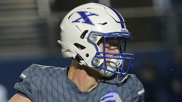 St. Xavier tight end Marshall Lang (88) runs the ball during the playoff game against Mason, Friday, Nov. 8, 2019.

Mason20