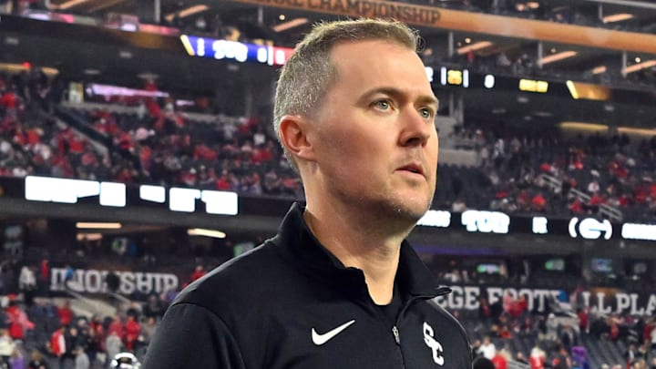 Jan 9, 2023; Inglewood, CA, USA; Southern California Trojans head coach Lincoln Riley walks the field before the CFP national championship game between the TCU Horned Frogs and the Georgia Bulldogs at SoFi Stadium. Mandatory Credit: Jayne Kamin-Oncea-Imagn Images Jan 9, 2023; Inglewood, CA, USA; Southern California Trojans head coach Lincoln Riley walks the field before the CFP national championship game between the TCU Horned Frogs and the Georgia Bulldogs at SoFi Stadium. Mandatory Credit: Jayne Kamin-Oncea-Imagn Images