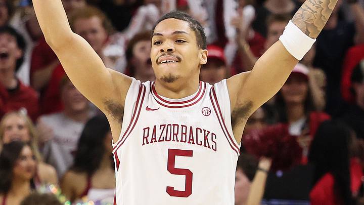 Mar 4, 2026; Fayetteville, Arkansas, USA; Arkansas Razorbacks guard Darius Acuff Jr (5) celebrates after a play against the Texas Longhorns during the first half at Bud Walton Arena. Mandatory Credit: Nelson Chenault-Imagn Images