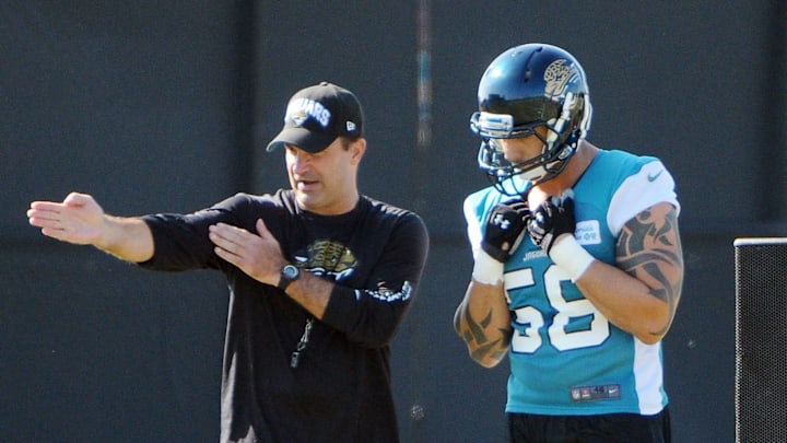 Bob.Self@jacksonville.com--11/29/12--Newly signed Jaguar Jason Babin gets instructions from Defensive Line Coach Joe Cullen during Tursday's Jaguar practice session. Jason Babin sported the number 58 during his first practice with the Jacksonville Jaguars at the Florida Blue Health and Wellness practice field Thursday morning after the team signed the pass rusher to their roster, November 29, 2012. (The Florida Times-Union, Bob Self)
Spt 02newjagbabin112 Bob.Self@jacksonville.com--11/29/12--Newly signed Jaguar Jason Babin gets instructions from Defensive Line Coach Joe Cullen during Tursday's Jaguar practice session. Jason Babin sported the number 58 during his first practice with the Jacksonville Jaguars at the Florida Blue Health and Wellness practice field Thursday morning after the team signed the pass rusher to their roster, November 29, 2012. (The Florida Times-Union, Bob Self)
Spt 02newjagbabin112