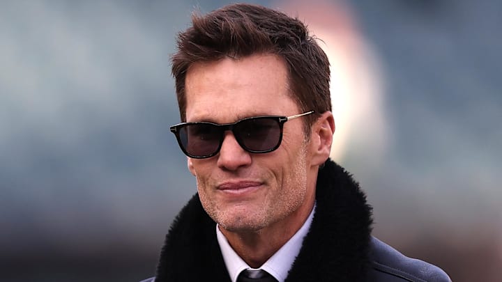 Jan 12, 2025; Philadelphia, Pennsylvania, USA; Announcer Tom Brady looks on before an NFC wild card game between the Philadelphia Eagles and the Green Bay Packers at Lincoln Financial Field. Mandatory Credit: Bill Streicher-Imagn Images Jan 12, 2025; Philadelphia, Pennsylvania, USA; Announcer Tom Brady looks on before an NFC wild card game between the Philadelphia Eagles and the Green Bay Packers at Lincoln Financial Field. Mandatory Credit: Bill Streicher-Imagn Images