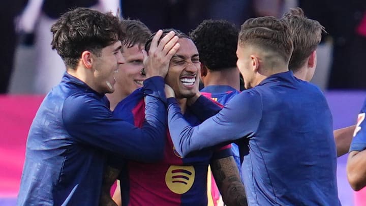 Raphinha (middle) scored the winner for Barcelona vs. Celta Vigo deep into stoppage time.