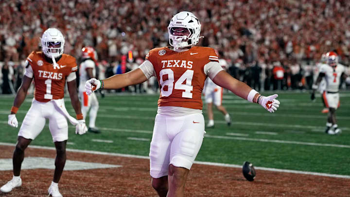 Texas Longhorns tight end Jordan Washington (84) reacts after scoring a touchdown during the first half against the Sam Houston Bearkats at Darrell K Royal-Texas Memorial Stadium. 