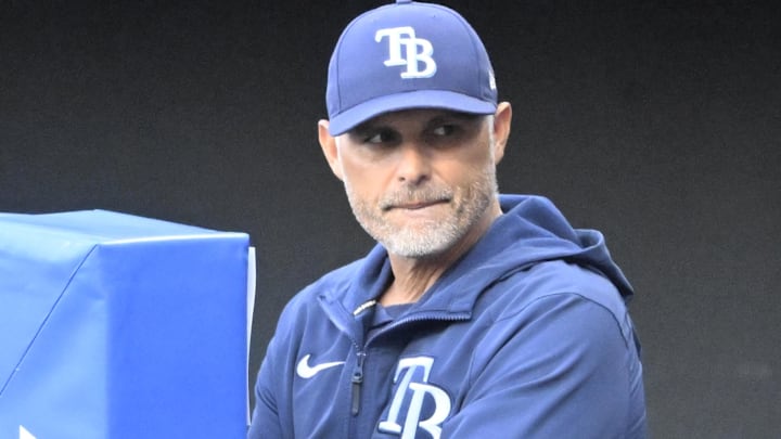 Aug 26, 2025; Cleveland, Ohio, USA; Tampa Bay Rays manager Kevin Cash (16) stands in the dugout in the first inning against the Cleveland Guardians at Progressive Field. 