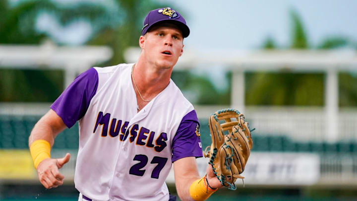 Fort Myers Mighty Mussels outfielder Walker Jenkins (27) catches a ball from the dugout during the second inning of a game against the Tampa Tarpons at Hammond Stadium in Fort Myers, Fla., on June 28, 2024. Fort Myers Mighty Mussels outfielder Walker Jenkins (27) catches a ball from the dugout during the second inning of a game against the Tampa Tarpons at Hammond Stadium in Fort Myers, Fla., on June 28, 2024.