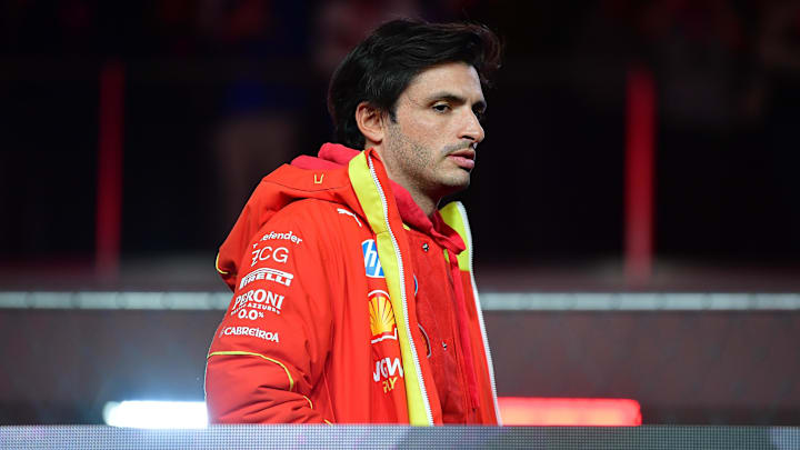 Nov 23, 2024; Las Vegas, Nevada, USA; Scuderia Ferrari driver Carlos Sainz (55) is intriduced before the Las Vegas Grand Prix at Las Vegas Circuit. Mandatory Credit: Gary A. Vasquez-Imagn Images