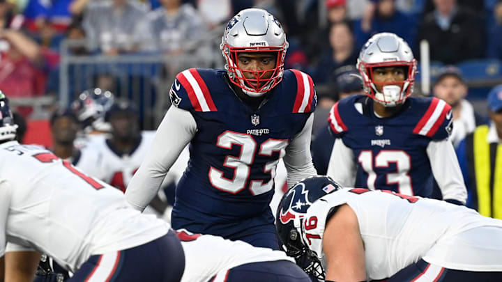 Aug 10, 2023; Foxborough, Massachusetts, USA; New England Patriots linebacker Anfernee Jennings (33) waits on the snap of the ball during the first half against the Houston Texans at Gillette Stadium. Mandatory Credit: Eric Canha-Imagn Images