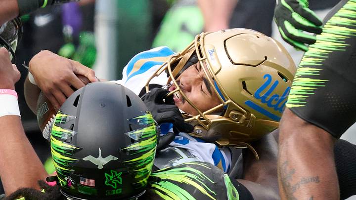 Oct 10, 2026; Eugene, Oregon, USA; UCLA Bruins quarterback Nico Iamaleava (9) is injured on a play as he is tackled by Oregon Ducks defensive lineman Bear Alexander (1) during the first half at Autzen Stadium. Mandatory Credit: Troy Wayrynen-Imagn Images Oct 10, 2026; Eugene, Oregon, USA; UCLA Bruins quarterback Nico Iamaleava (9) is injured on a play as he is tackled by Oregon Ducks defensive lineman Bear Alexander (1) during the first half at Autzen Stadium. Mandatory Credit: Troy Wayrynen-Imagn Images