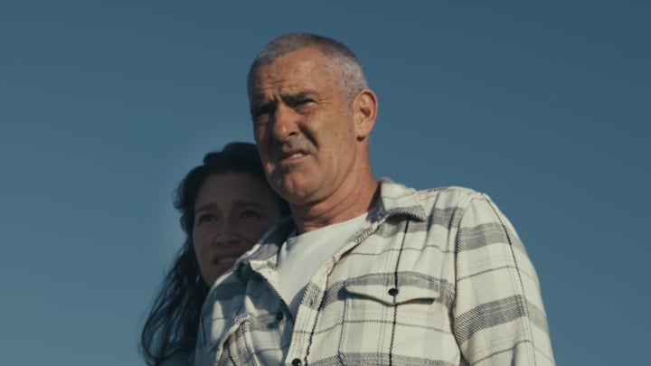 Garrett and Nicole McNamara observing the sea