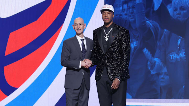 Jun 25, 2025; Brooklyn, NY, USA;  Thomas Sorber stands with NBA commissioner Adam Silver after being selected as the 15th pick by the Oklahoma City Thunder in the first round of the 2025 NBA Draft at Barclays Center. Mandatory Credit: Brad Penner-Imagn Images