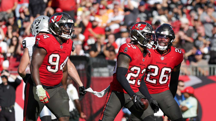 Dec 8, 2024; Tampa, Florida, USA; Tampa Bay Buccaneers safety Tykee Smith (23) celebrates after intercepting the ball against the Las Vegas Raiders in the third quarter at Raymond James Stadium. Mandatory Credit: Nathan Ray Seebeck-Imagn Images