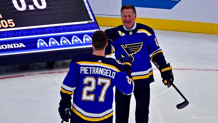 Jan 24, 2020; St. Louis, Missouri, USA; St. Louis Blues defenseman Alex Pietrangelo (27) with former player Bernie Federko during the accuracy shooting competition in the 2020 NHL All Star Game Skills Competition at Enterprise Center. Mandatory Credit: Jeff Curry-USA TODAY Sports