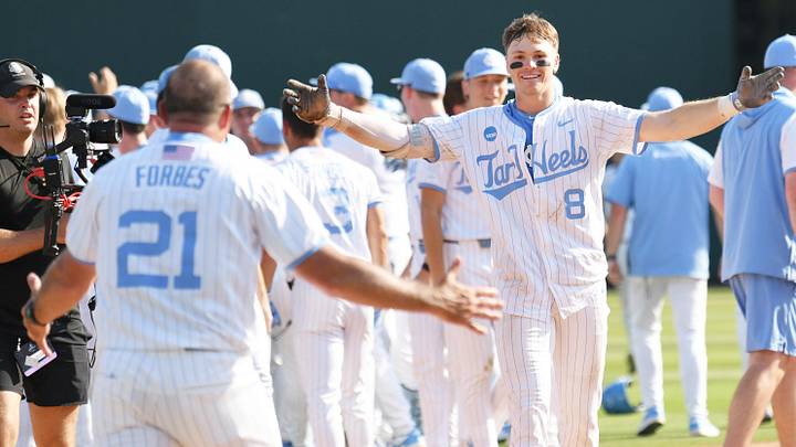 June 7, 2026; Chapel Hill, NC, USA; North Carolina Tar Heels outfielder Owen Hull (8) celebrates with head coach Scott Forbes after his game winning hit against the USC Trojans at Boshamer Stadium. Mandatory Credit: Zachary Taft-Imagn Images June 7, 2026; Chapel Hill, NC, USA; North Carolina Tar Heels outfielder Owen Hull (8) celebrates with head coach Scott Forbes after his game winning hit against the USC Trojans at Boshamer Stadium. Mandatory Credit: Zachary Taft-Imagn Images
