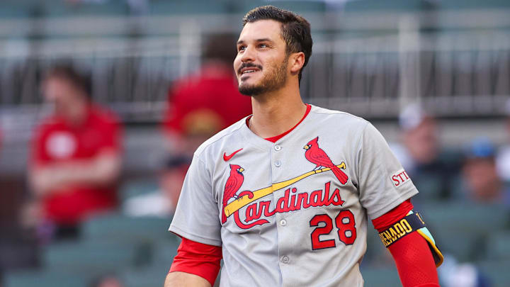 Apr 21, 2025; Atlanta, Georgia, USA; St. Louis Cardinals third baseman Nolan Arenado (28) reacts after a strikeout against the Atlanta Braves in the first inning at Truist Park Apr 21, 2025; Atlanta, Georgia, USA; St. Louis Cardinals third baseman Nolan Arenado (28) reacts after a strikeout against the Atlanta Braves in the first inning at Truist Park