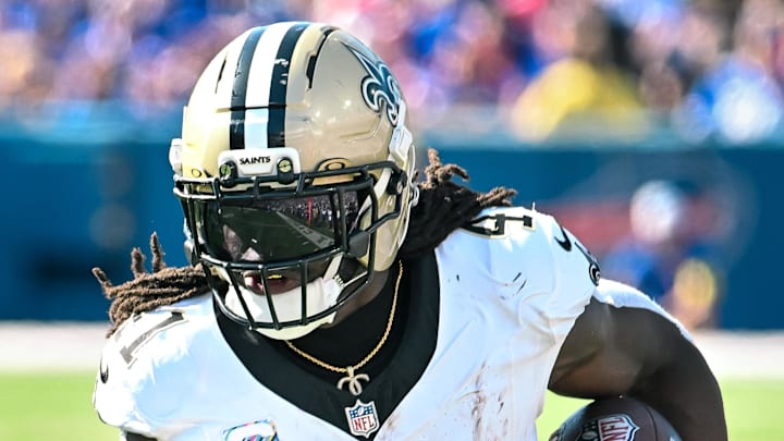 Sep 28, 2025; Orchard Park, New York, USA; New Orleans Saints running back Alvin Kamara (41) carries the ball against the Buffalo Bills in the third quarter at Highmark Stadium. Mandatory Credit: Mark Konezny-Imagn Images Sep 28, 2025; Orchard Park, New York, USA; New Orleans Saints running back Alvin Kamara (41) carries the ball against the Buffalo Bills in the third quarter at Highmark Stadium. Mandatory Credit: Mark Konezny-Imagn Images