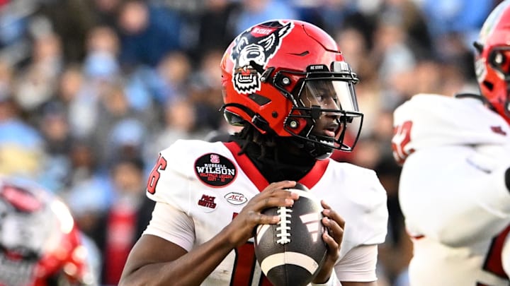 Nov 30, 2024; Chapel Hill, North Carolina, USA; North Carolina State Wolfpack quarterback CJ Bailey (16) looks to pass in the first quarter at Kenan Memorial Stadium. Mandatory Credit: Bob Donnan-Imagn Images Nov 30, 2024; Chapel Hill, North Carolina, USA; North Carolina State Wolfpack quarterback CJ Bailey (16) looks to pass in the first quarter at Kenan Memorial Stadium. Mandatory Credit: Bob Donnan-Imagn Images