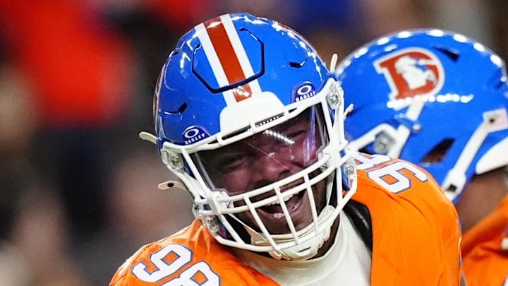 Nov 6, 2025; Denver, Colorado, USA; Denver Broncos defensive end John Franklin-Myers (98) reacts against the Las Vegas Raiders during the first half at Empower Field at Mile High. Mandatory Credit: Ron Chenoy-Imagn Images Nov 6, 2025; Denver, Colorado, USA; Denver Broncos defensive end John Franklin-Myers (98) reacts against the Las Vegas Raiders during the first half at Empower Field at Mile High. Mandatory Credit: Ron Chenoy-Imagn Images