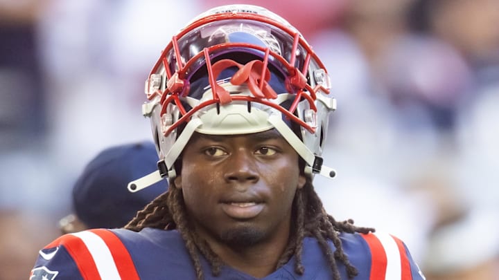 Dec 15, 2024; Glendale, Arizona, USA; New England Patriots running back Rhamondre Stevenson (38) against the Arizona Cardinals at State Farm Stadium. Mandatory Credit: Mark J. Rebilas-Imagn Images Dec 15, 2024; Glendale, Arizona, USA; New England Patriots running back Rhamondre Stevenson (38) against the Arizona Cardinals at State Farm Stadium. Mandatory Credit: Mark J. Rebilas-Imagn Images
