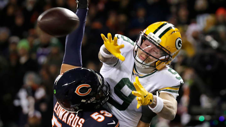 Chicago Bears linebacker T.J. Edwards (53) breaks up a pass intended for Green Bay Packers receiver Christian Watson.
