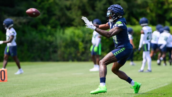 Jul 27, 2024; Renton, WA, USA; Seattle Seahawks wide receiver DK Metcalf (14) catches a pass during training camp at Virginia Mason Athletic Center. Jul 27, 2024; Renton, WA, USA; Seattle Seahawks wide receiver DK Metcalf (14) catches a pass during training camp at Virginia Mason Athletic Center.