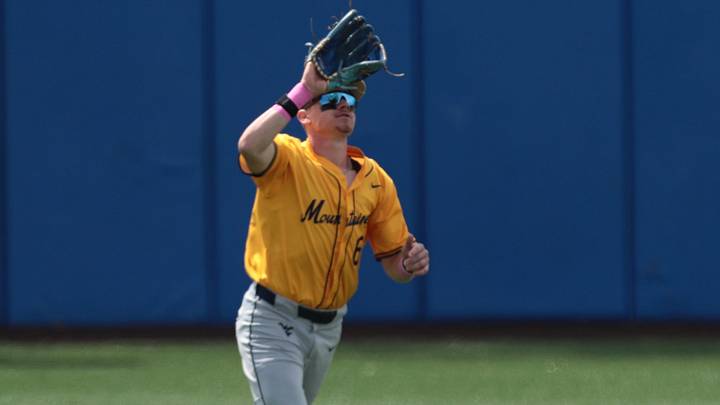 West Virginia Mountaineers fifth year senior Paul Schoenfeld (6) makes an out against Kansas Jayhawks during the game inside Hoglund Ballpark on May 10, 2026.