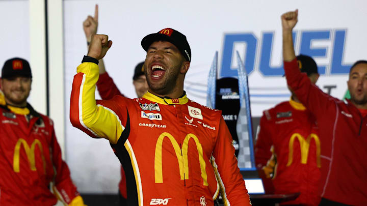 Feb 13, 2025; Daytona Beach, Florida, USA; NASCAR Cup Series driver Bubba Wallace (23) reacts after winning Duel 1 at Daytona International Speedway. Mandatory Credit: Peter Casey-Imagn Images Feb 13, 2025; Daytona Beach, Florida, USA; NASCAR Cup Series driver Bubba Wallace (23) reacts after winning Duel 1 at Daytona International Speedway. Mandatory Credit: Peter Casey-Imagn Images
