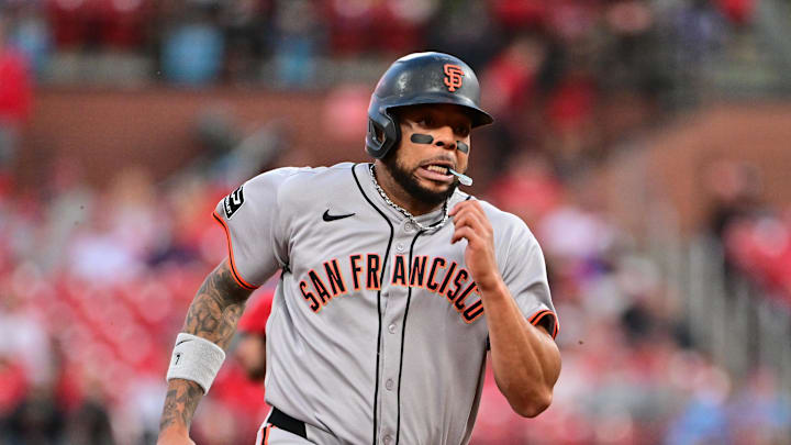 Sep 6, 2025; St. Louis, Missouri, USA; San Francisco Giants designated hitter Dominic Smith (7) digs for third base in the fourth inning against the St. Louis Cardinals off a hit by teammate San Francisco Giants third baseman Matt Chapman (not shown) at Busch Stadium. Mandatory Credit: Tim Vizer-Imagn Images Sep 6, 2025; St. Louis, Missouri, USA; San Francisco Giants designated hitter Dominic Smith (7) digs for third base in the fourth inning against the St. Louis Cardinals off a hit by teammate San Francisco Giants third baseman Matt Chapman (not shown) at Busch Stadium. Mandatory Credit: Tim Vizer-Imagn Images