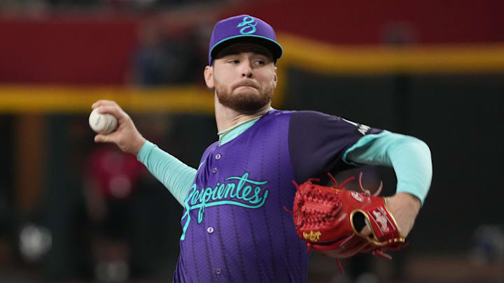 Jul 5, 2025; Phoenix, Arizona, USA; Arizona Diamondbacks relief pitcher Ryne Nelson (19) throws against the Kansas City Royals in the first inning at Chase Field. Mandatory Credit: Rick Scuteri-Imagn Images