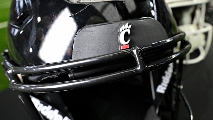 Jul 13, 2023; Arlington, TX, USA; A view of the Cincinnati Bearcats helmet and logo during the Big 12 football media day at AT&T Stadium. Mandatory Credit: Jerome Miron-Imagn Images