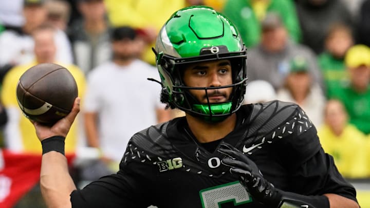 Oct 11, 2025; Eugene, Oregon, USA; Oregon Ducks quarterback Dante Moore (5) throws a pass against the Indiana Hoosiers during the first quarter at Autzen Stadium. Mandatory Credit: Troy Wayrynen-Imagn Images Oct 11, 2025; Eugene, Oregon, USA; Oregon Ducks quarterback Dante Moore (5) throws a pass against the Indiana Hoosiers during the first quarter at Autzen Stadium. Mandatory Credit: Troy Wayrynen-Imagn Images