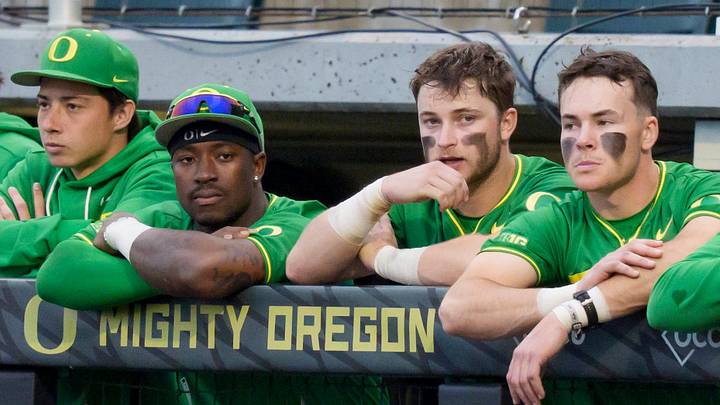 Oregon lines the dugout as the Oregon Ducks host the Oregon State Beavers on March 3, 2026, at PK Park in Eugene, Oregon.