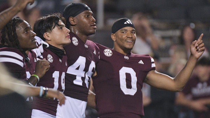 Mississippi State Bulldogs quarterback Michael Van Buren Jr. (0) celebrates with teammates after a game against the Massachusetts Minutemen at Davis Wade Stadium at Scott Field.
