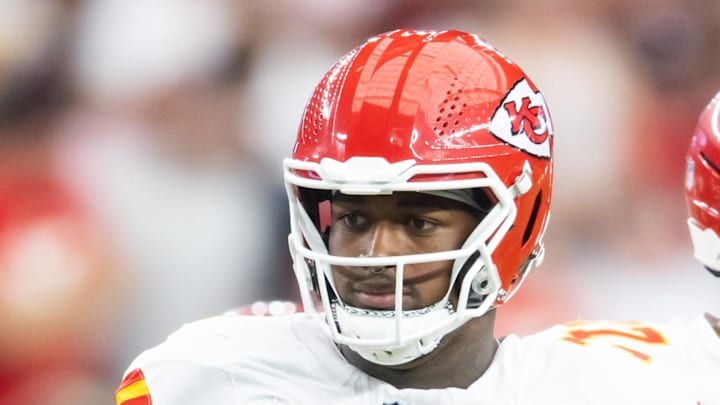 Aug 9, 2025; Glendale, Arizona, USA; Kansas City Chiefs offensive tackle Josh Simmons (71) against the Arizona Cardinals during a preseason NFL game at State Farm Stadium. Mandatory Credit: Mark J. Rebilas-Imagn Images