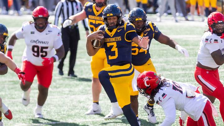 Oct 17, 2026; Morgantown, West Virginia, USA;  West Virginia Mountaineers quarterback Michael Hawkins Jr. (3) runs the ball for a touchdown during the second quarter against the Cincinnati Bearcats at Milan Puskar Stadium.  Mandatory Credit: Ben Queen-Imagn Images