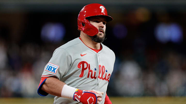May 20, 2025; Denver, Colorado, USA; Philadelphia Phillies designated hitter Kyle Schwarber (12) rounds the bases on a solo home run in the seventh inning against the Colorado Rockies at Coors Field. 
