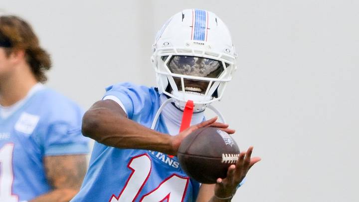 Jun 16, 2026; Nashville, TN, USA;  Tennessee Titans wider receiver Carnell Tate (14) makes a catch during day 1 of mini-camp at Vanderbilt Health Football Center. Mandatory Credit: Steve Roberts-Imagn Images
