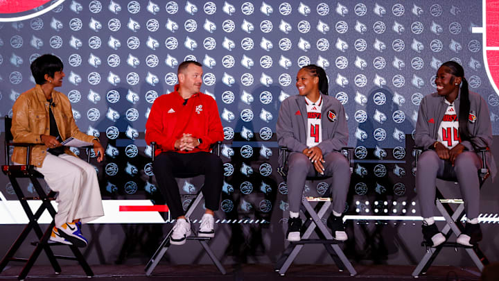 Louisville women's basketball head coach Jeff Walz (center left), forward Mackenly Randolph (center right) and forward Olivia Cochran (far right) speak at the 2024 ACC Basketball Tipoff.