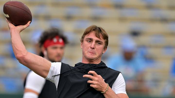 Oct 17, 2026; Pasadena, California, USA; Wisconsin Badgers quarterback Colton Joseph (1) warms up prior to the game against the UCLA Bruins at the Rose Bowl. Oct 17, 2026; Pasadena, California, USA; Wisconsin Badgers quarterback Colton Joseph (1) warms up prior to the game against the UCLA Bruins at the Rose Bowl.