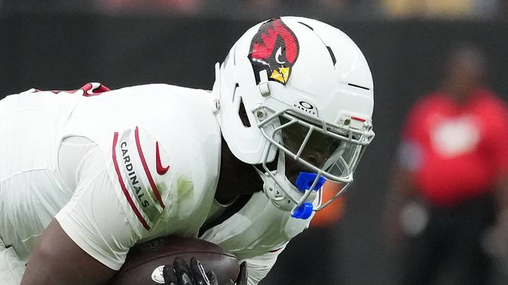 Aug 13, 2026; Paradise, Nevada, USA; Arizona Cardinals running back Jeremiyah Love (4) carries the ball against Las Vegas Raiders cornerback Taron Johnson (3) in the first half at Allegiant Stadium. Mandatory Credit: Kirby Lee-Imagn Images Aug 13, 2026; Paradise, Nevada, USA; Arizona Cardinals running back Jeremiyah Love (4) carries the ball against Las Vegas Raiders cornerback Taron Johnson (3) in the first half at Allegiant Stadium. Mandatory Credit: Kirby Lee-Imagn Images
