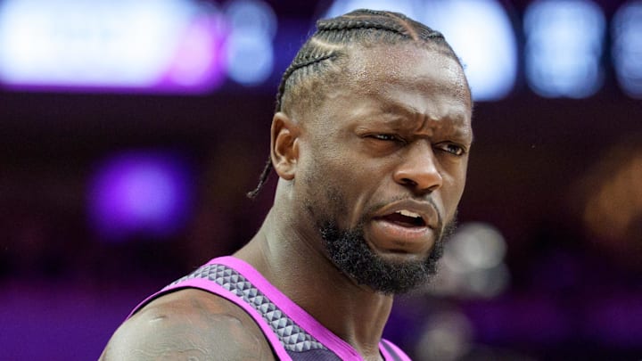Feb 20, 2026; Minneapolis, Minnesota, USA; Minnesota Timberwolves forward Julius Randle (30) talks with referee Josh Tiven (58) in the fourth quarter against the Dallas Mavericks at Target Center. Mandatory Credit: Matt Blewett-Imagn Images
