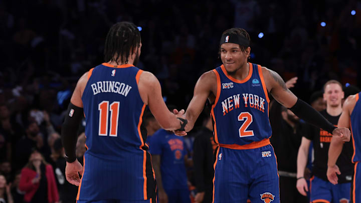 May 14, 2024; New York, New York, USA; New York Knicks guard Miles McBride (2) celebrates with guard Jalen Brunson (11) during the second half during game five of the second round for the 2024 NBA playoffs against the Indiana Pacers at Madison Square Garden. Mandatory Credit: Vincent Carchietta-Imagn Images