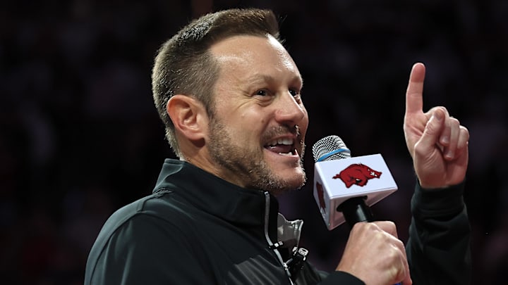 Arkansas Razorbacks football coach Ryan Silverfield speaks to the crowd during halftime against the Louisville Cardinals at Bud Walton Arena.